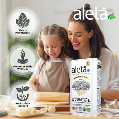 ELLORA FARMS Aleta organic PDO extra virgin olive oil tin with a mother and daughter cooking together in a kitchen