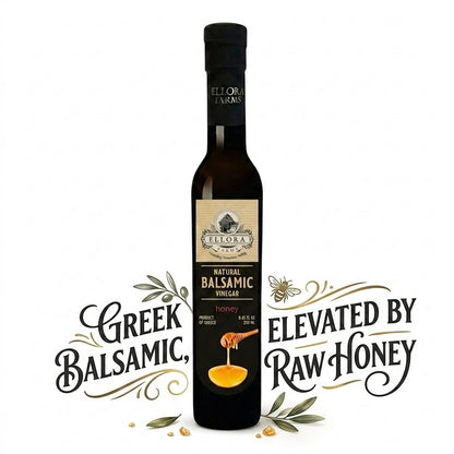 ELLORA FARMS Greek honey infused balsamic vinegar in a tall glass bottle with elegant typography and honey dipper icon.