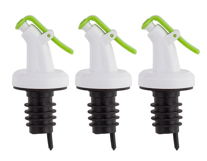 Three ELLORA FARMS professional chef bottle spouts with white bodies, green snap-on lids, and black ribbed bases.