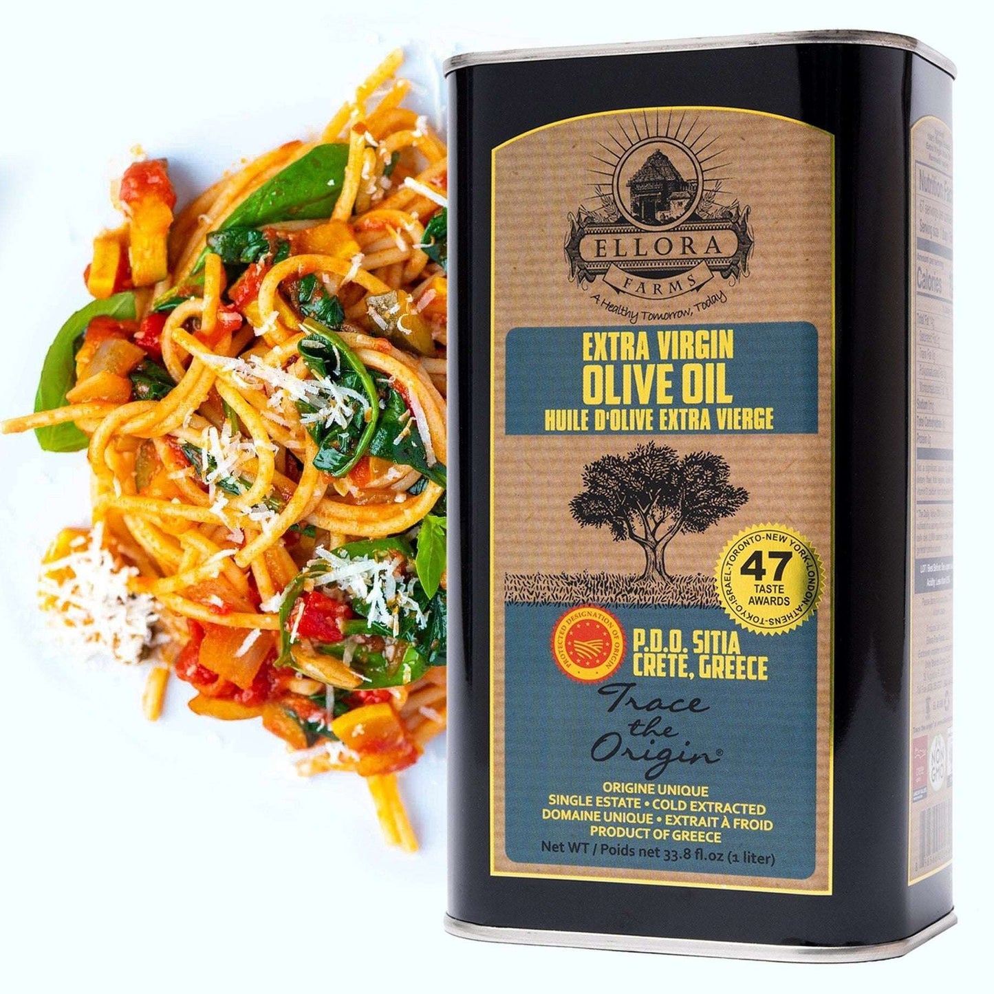 ELLORA FARMS PDO Sitia extra virgin Greek olive oil 1 liter tin next to a plate of fresh vegetable pasta